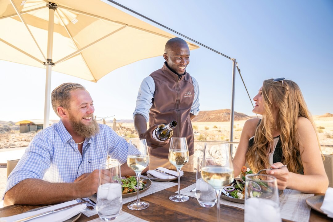 Diverse group of professionals discussing around a table